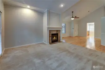 Vaulted ceilings in Living Space with gas fireplace to warm your winter evenings!