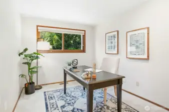 One of four secondary bedrooms, thoughtfully staged as a home office