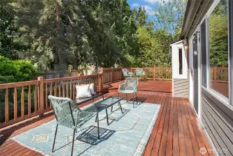 Expansive west-facing deck — perfect for entertaining, relaxing, and hosting summer BBQs