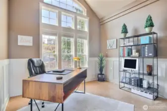 Main floor remodeled office features exquisite 18-inch Italian Travertine tile floors.