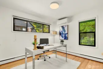 Second main floor bedroom with views of the private backyard.