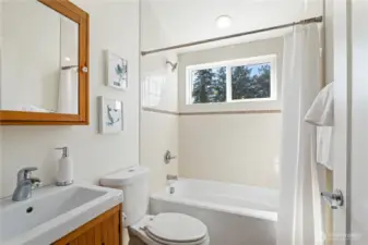 The full bathroom upstairs includes heated tile floors.