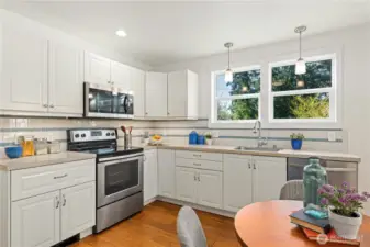 You'll love to cook in this roomy kitchen, equipped with stainless steel appliances and a large pantry.