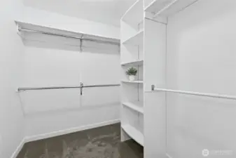 Spacious walk-in closet with ample storage.