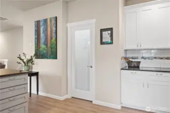 Custom frosted door to the walk-in kitchen pantry.
