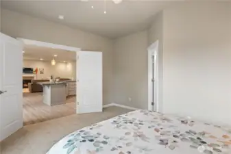 Primary Bedroom with French Doors to the Kitchen/Dining/Living Room