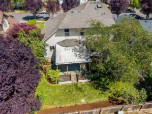 Large lot with fully-fenced backyard, mature landscaping & trees, fruit trees, garden, covered patio, side yards, privacy and pavers throughout.