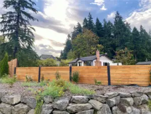 West facing side of home with entry to the driveway.