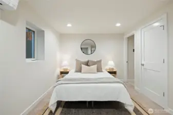 Cozy carpet, natural light, heating and cooling provided by the mini-split - this is a comfortable primary suite!