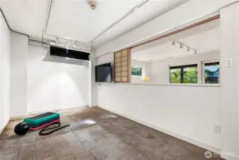 Flexible bonus room with natural light—perfect for remote work, fitness, or additional lounge space.