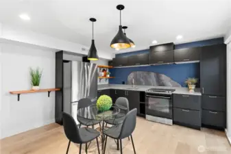 Fully equipped ADU kitchen with dedicated living and dining space—self-contained and functional.