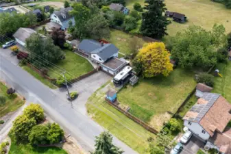 This property is .89 acres and has tons of parking, RV Parking and a large separate yard area perfect for a "Hobby Farm"