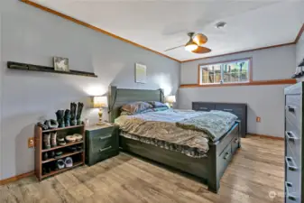 Primary Suite located on lower level of home.  Beautiful luxury vinyl plank flooring throughout the lower level.