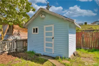 Garden shed at rear of home