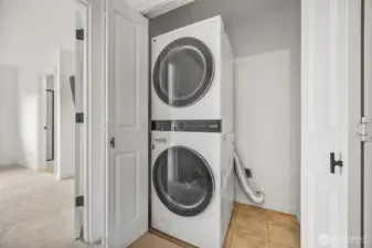 Hi-end x-large washer and dryer. Plenty of room for racks in same closet.