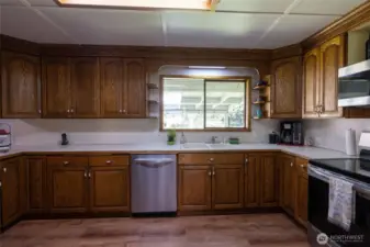 Large kitchen with plenty of cupboard space.