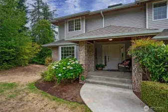 Large covered front porch entry to welcome you home