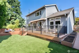 Upgraded backyard with TREX deck and artificial turf