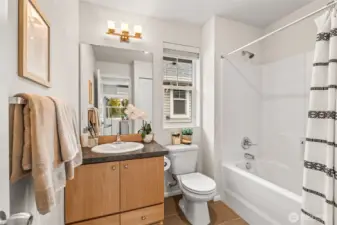 Your upper full bathroom located just outside your second and third bedrooms.