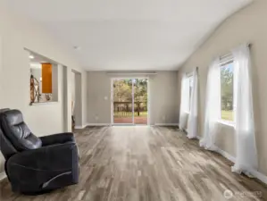 Family room with slider leading to the backyard deck