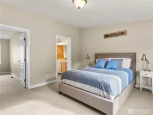 Primary bedroom with 2 walk-in-closets
