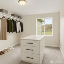 1 of 2 Primary bedroom walk-in-closet *virtually staged*
