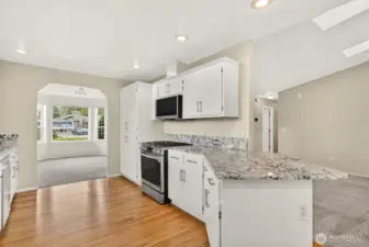 Kitchen has hardwood floors