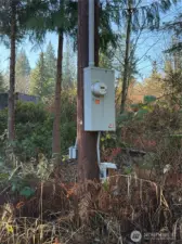 Power pole on property, with RV