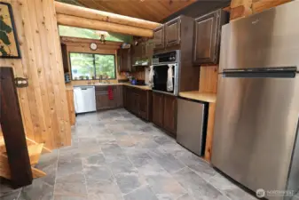 Functional kitchen positioned to capture views, with easy flow into the living area for relaxed entertaining.