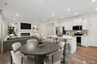 Dining area off of kitchen and living room.   Pictures are for representational purposes only, colors and features may vary.