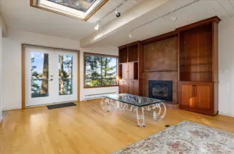 Living Room features propane fireplace plus French Doors to the Deck