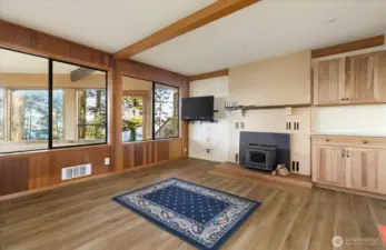 Lower Level Family Room with wood fireplace