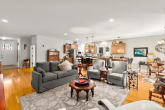 A warm entry way leads you into a spacious open concept living area