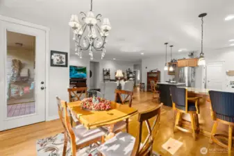 Beautiful dining area cozy enough for 1 or 2 and spacious enough for family & friends too.  Your kitchen & dining connect seamlessly to your back deck to easily expand your entertaining.