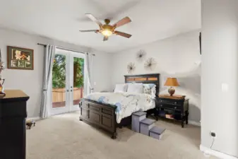 Your spacious Primary Bedroom retreat - the perfect place to begin and end your day. And you also have access to your back deck!