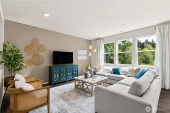 Bright great room is next to your kitchen and dining room.