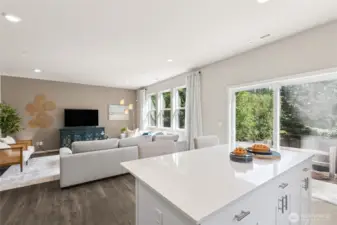 Solid 1 level island with overhang for bar stools. Great space for having coffee or meal prep!