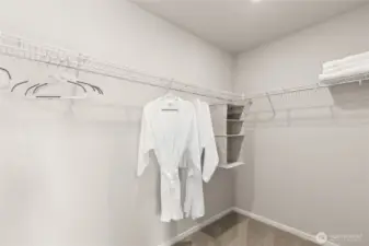 Primary walk-in closet! Pictures are for representation only as colors and options will vary.