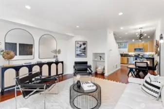 Living room opens to dining area and kitchen. Abundant light and space!