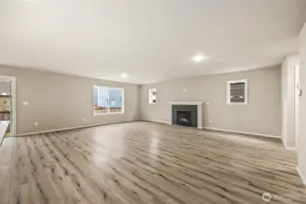 Open concept living/dining/kitchen-Interior Pictures: Disclaimer- Photos are of another Finley floor plan from a previous community, photos are for illustrative purposes only. Finishes, flooring, upgrades, or other features may vary.