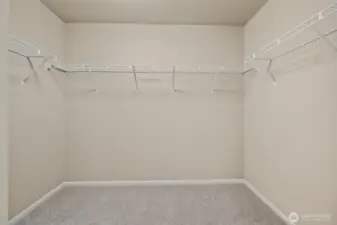 Primary WIC-Interior Pictures: Disclaimer- Photos are of another Finley floor plan from a previous community, photos are for illustrative purposes only. Finishes, flooring, upgrades, or other features may vary.