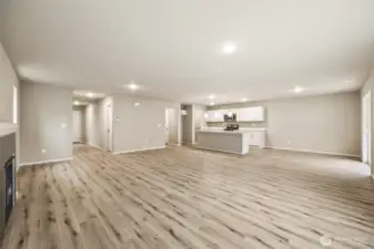 Open concept living/dining/kitchen-Interior Pictures: Disclaimer- Photos are of another Finley floor plan from a previous community, photos are for illustrative purposes only. Finishes, flooring, upgrades, or other features may vary.