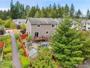 A path for neighborhood access to the park is shown here to the left of the fence. This extra space between the two homes gives you additional privacy.