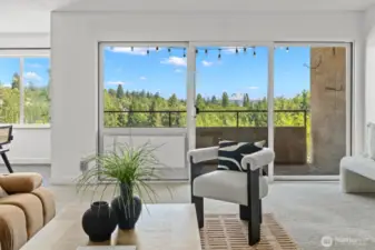 Expansive windows frame lush treetops and iconic Mt. Rainier. Bringing the outdoors in and giving your new living space a front row seat to the view.