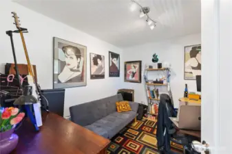This room is being used as an office currently.  It is on the main level, first door on the right as you enter.