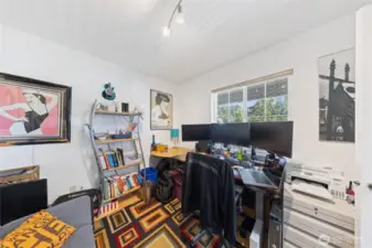 The main level office/bedroom has good natural light.