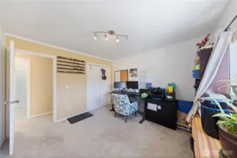 This shows the upper bedroom/office and the bathroom across the way.