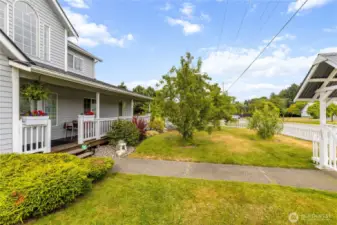 Large, lovely corner lot. Productive Fruit trees include Plum, Apple, Cherry and Pears.  Mature landscaping and lush flowering shrub provide pops of color.
