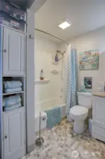 Bathroom from next to washer and dryer