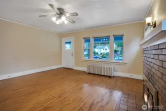 As you enter the home you are greeted by hardwood floors and classic design touches.